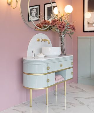 Freestanding bathroom cabinet in blue and gold