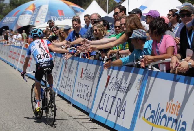 Thomas Danielson (Garmin-Sharp) greets the race fans