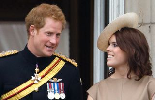 Prince Harry and Princess Eugenie stand on the balcony of Buckingham Palace during Trooping the Colour on June 13, 2015