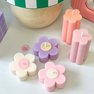 Flower shaped pastel candles