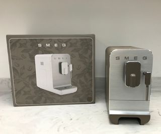 smeg coffee machine and box