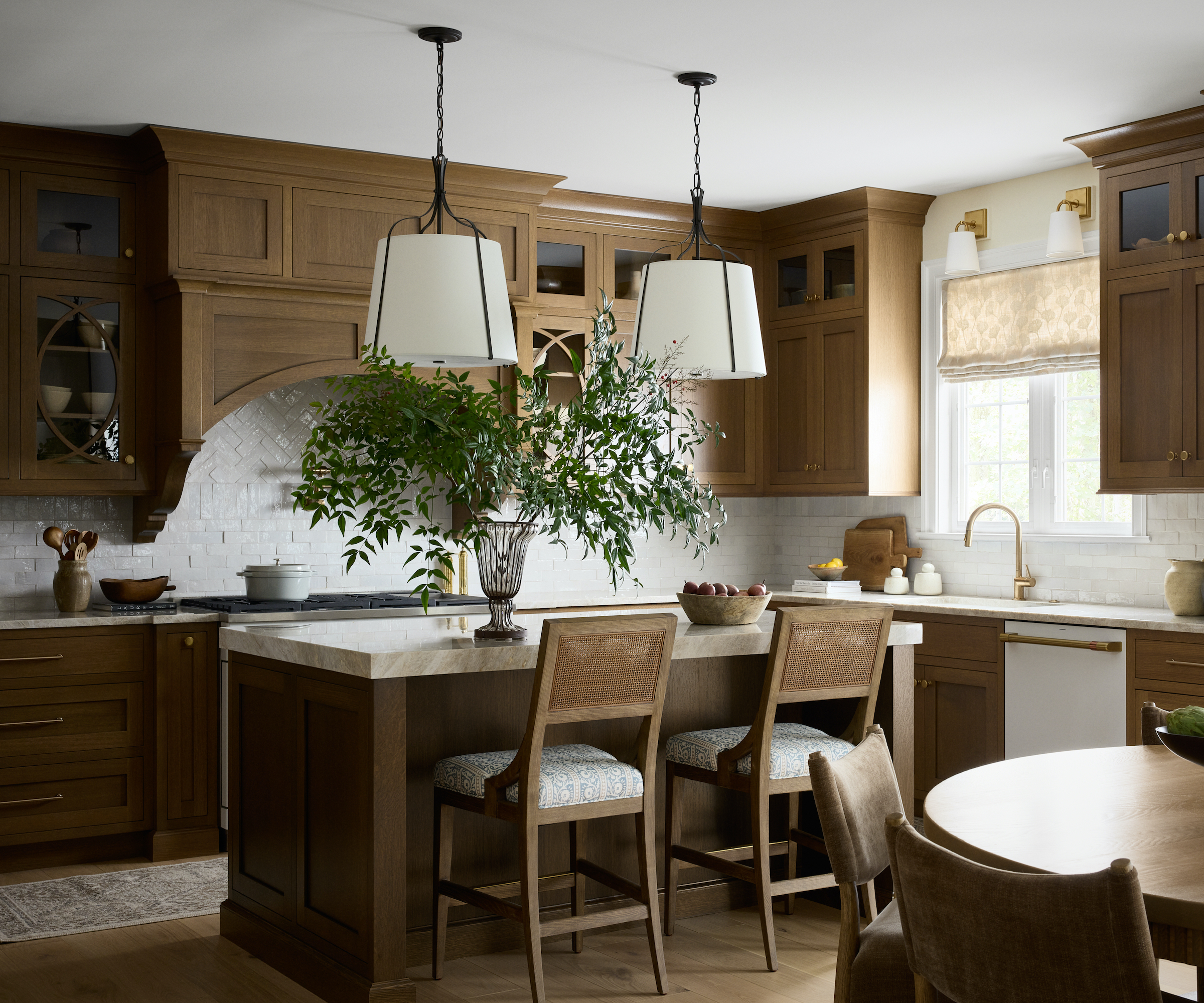 timber kitchen with marble worktops and island