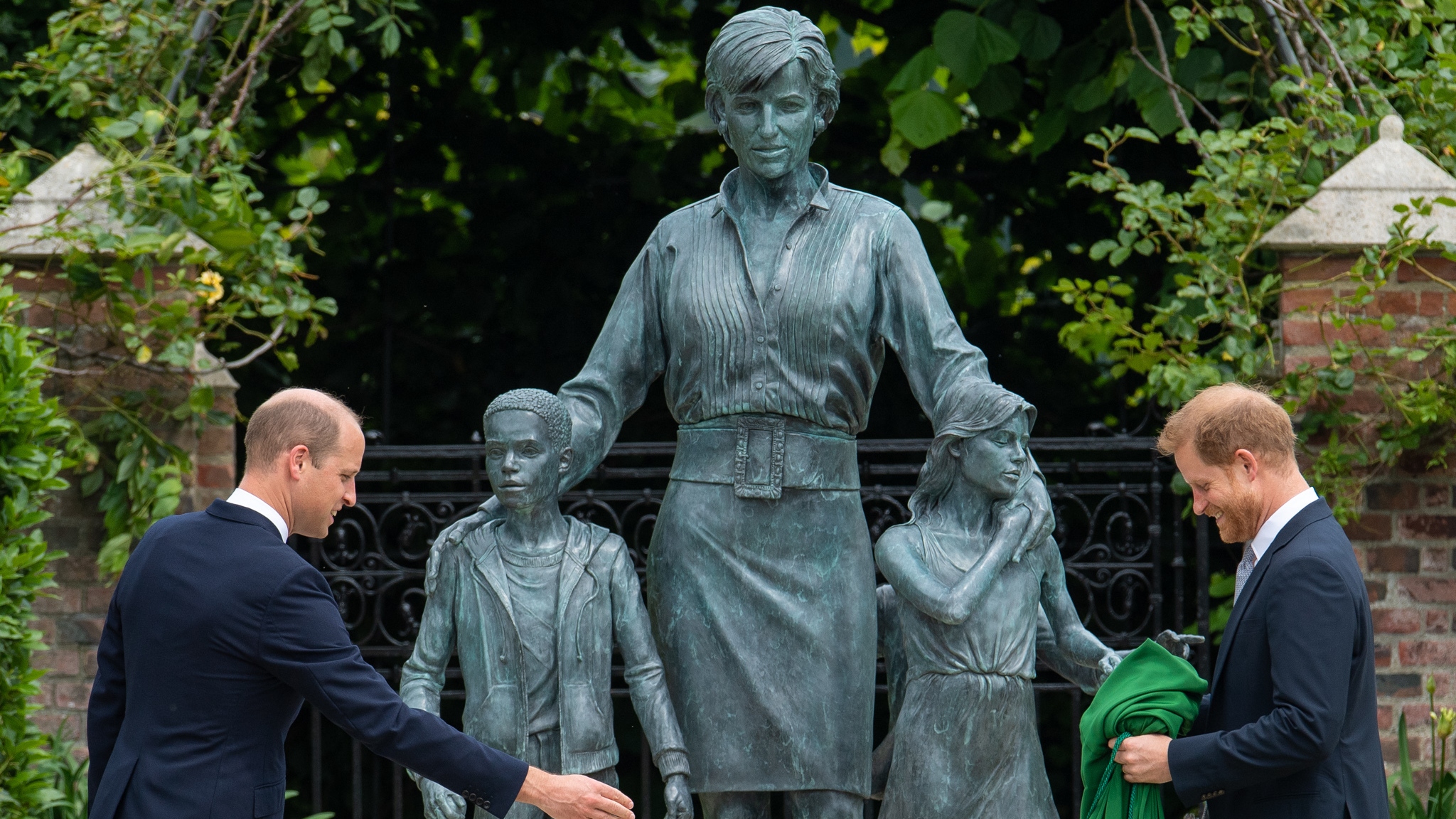 Prince William and Prince Harry, Duke of Sussex during the unveiling of a statue they commissioned of their mother Diana, Princess of Wales