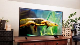 A Samsung F6000F LED TV on a side table.