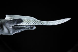 The 3D printed midsole was created using selective laser sintering.