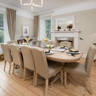 dining room cream wall with wooden floor and dining table