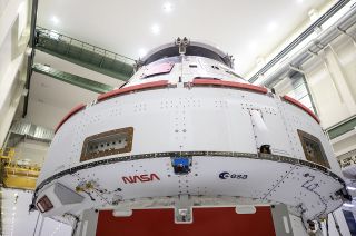 NASA’s "worm" logo and the European Space Agency's (ESA) logo have been added to the aft wall of the Orion spacecraft's crew module adapter for the Artemis I mission.