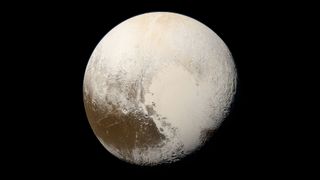 Pluto, as seen by the New Horizons spacecraft as it flew towards the planet on July 14, 2015, from a range of 22,025 miles (35,445 kilometers). 