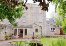 exterior of house garden with trees