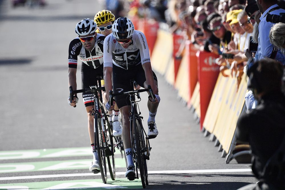 Chris Froome, Tom Dumoulin and Geraint Thomas finish stage 14 at the Tour de France