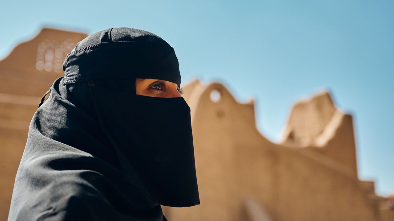 A woman in Riyadh, Saudi Arabia, wearing a Burqa