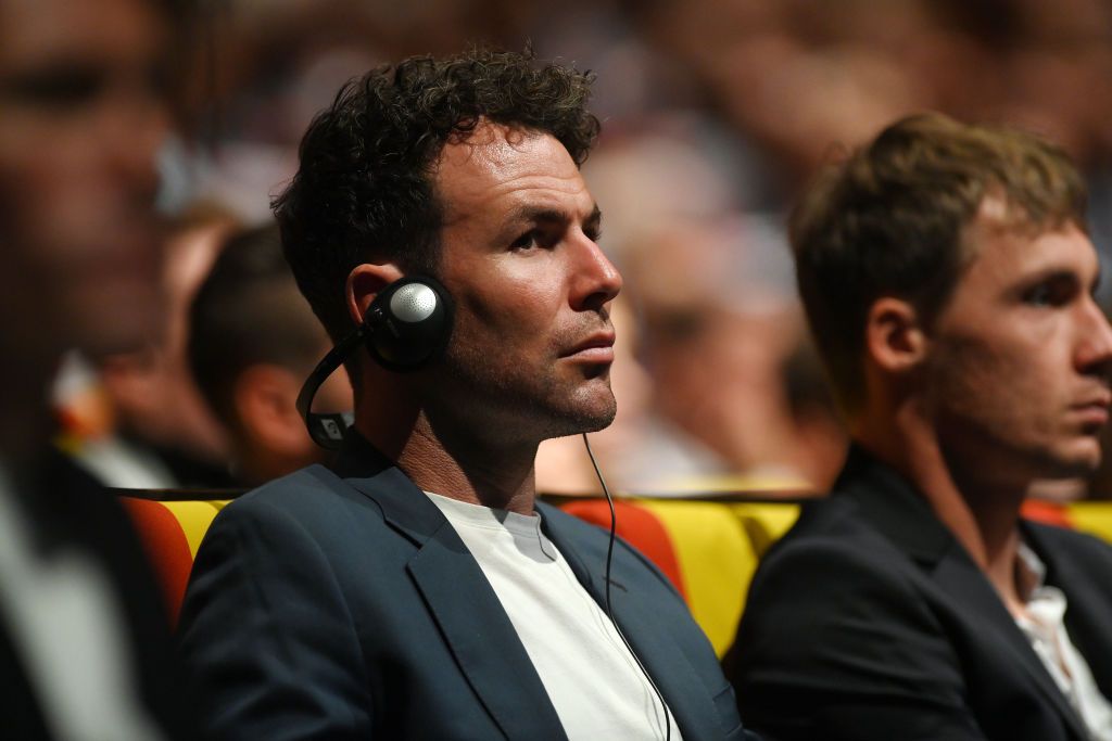 Mark Cavendish watches the presentation of the 2023 Tour de France and Tour de France Femmes