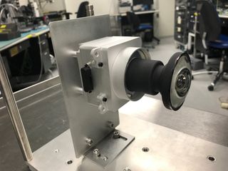 One of the enhanced engineering cameras with a prototype lens for the hazard cameras, which will watch for obstacles encountered by the Mars 2020 rover.