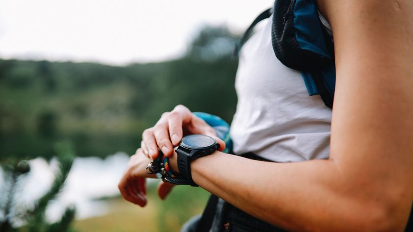 Athlete checking a sports watch