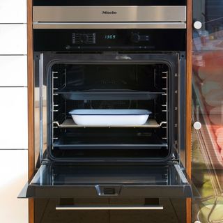 Close up of black oven and oven racks