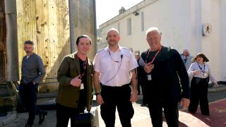 Connor Whyte and Richard Jobson of the Skids with Residential Officer David Poliri at HMP Barlinnie