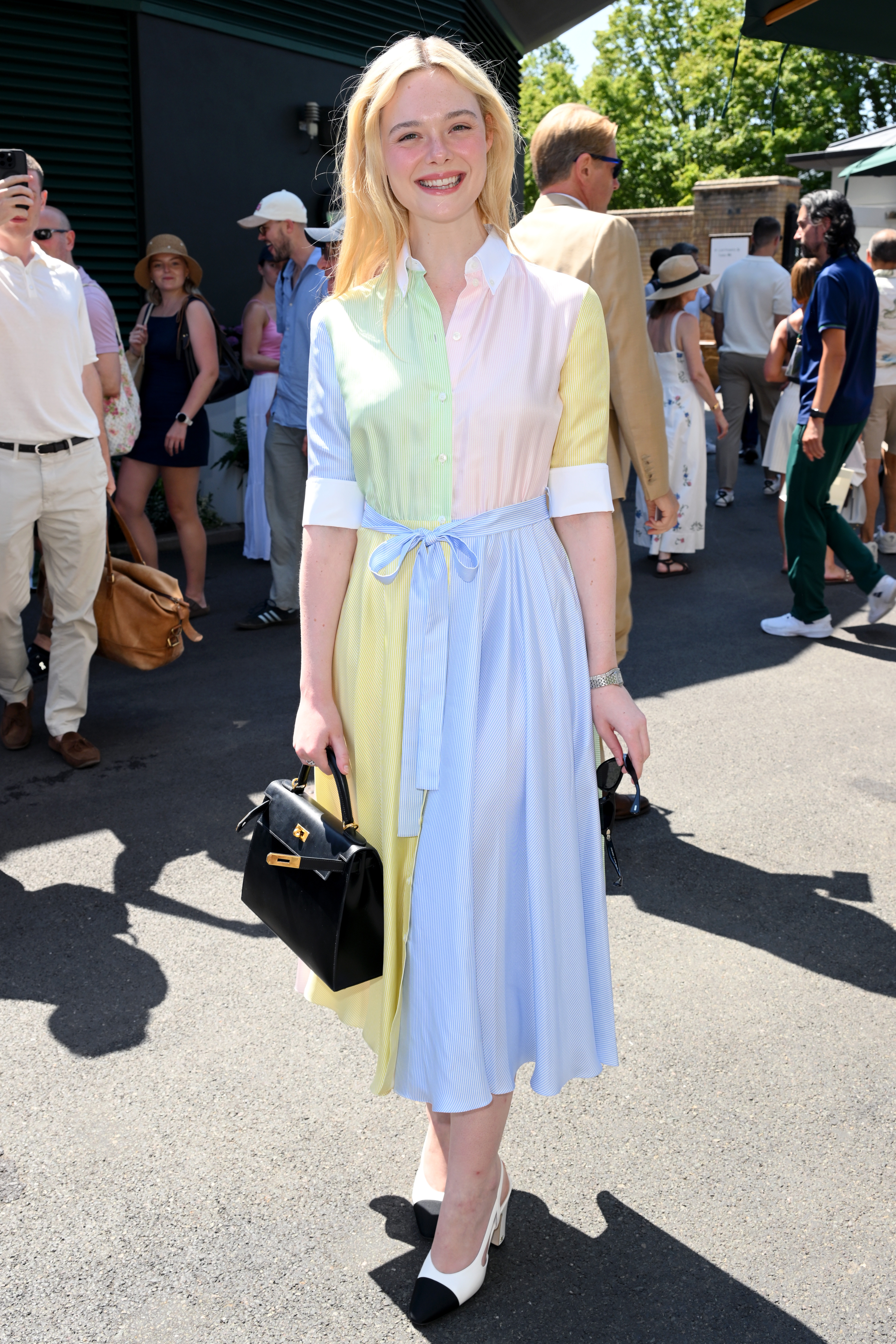 Elle Fanning attended Wimbledon 2026 in a Dior shirtdress, Chanel shoes, and a Herm&amp;egrave;s Kelly bag July 8