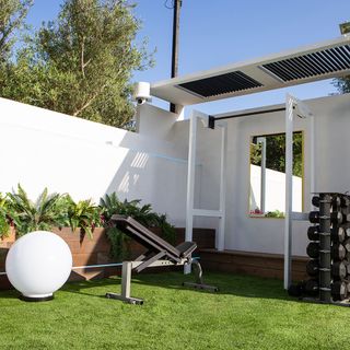 outdoor gym with gym equipment in grass lawn