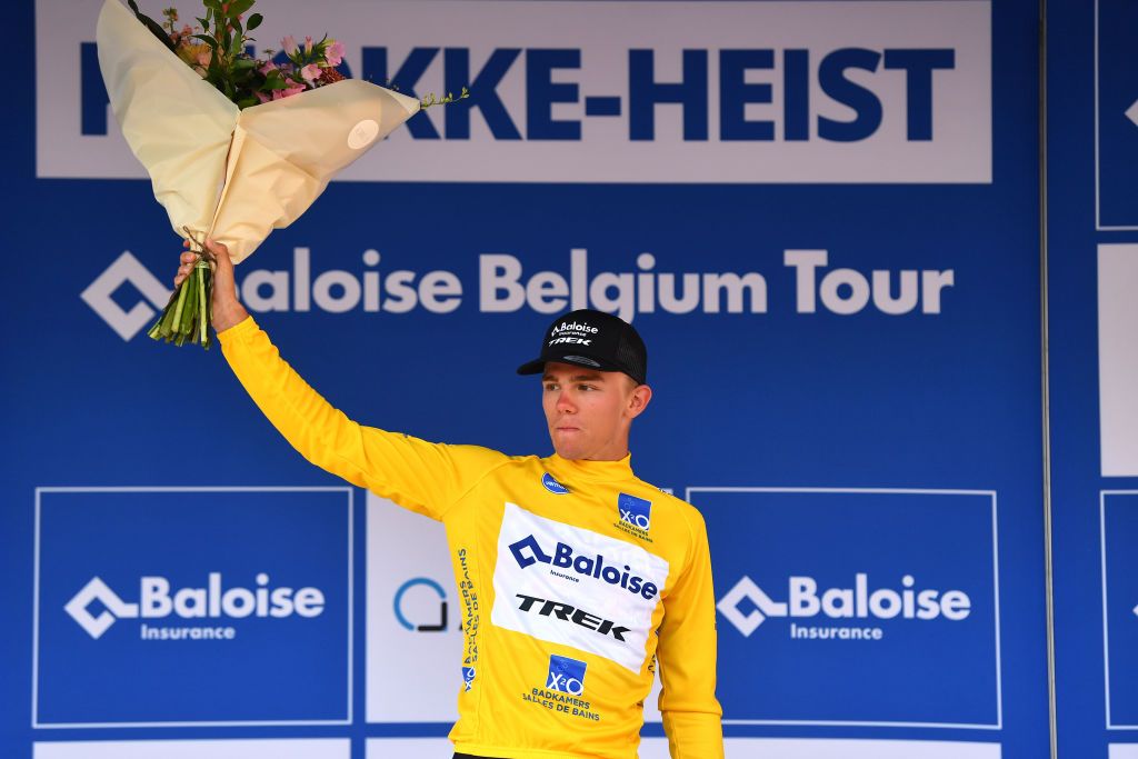 KNOKKEHEIST BELGIUM JUNE 16 Thibau Nys of Belgium and Team Baloise Trek Lions yellow best young jersey celebrates at podium winner during the 91st Baloise Belgium Tour 2022 Stage 2 a 1756km stage from Beveren to KnokkeHeist BaloiseBelgiumTour on June 16 2022 in KnokkeHeist Belgium Photo by Luc ClaessenGetty Images