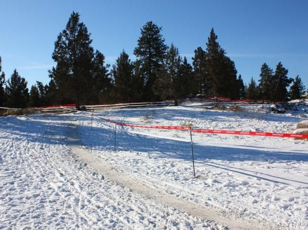 After passing through the pits, racers then sweep uphill into a wooded section.