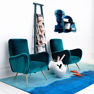 white wall with elm ladder and armchair