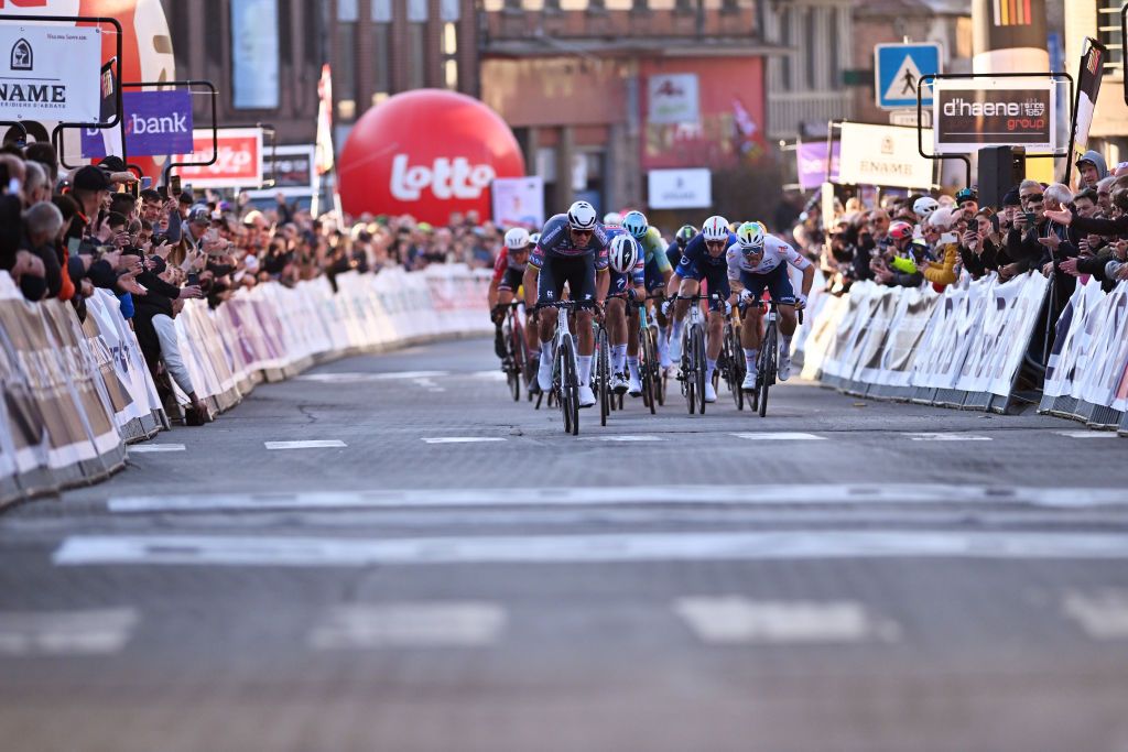 DOUR BELGIUM MARCH 04 LR Race winner Mathieu van der Poel of Netherlands and Team Alpecin Deceuninck Paul Magnier of France and Team Soudal QuickStep and Emilien Jeanniere of France and Team TotalEnergies sprint at finish line during the the 57th Ename Samyn Classic 2025 a 1991km one day race from Quaregnon to Dour on March 04 2025 in Dour Belgium Photo by Luc ClaessenGetty Images