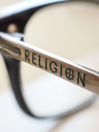 Focus stacked macro shot of a pair of spectacles taken on the OM System OM-3 with the Olympus M.Zuiko 30mm f/3.5 Macro