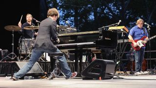 Drummer Darren Jessee, pianist/vocalist Ben Folds and bassist Robert Sledge of the band Ben Folds Five perform at Central Park SummerStage on September 14, 2012 in New York City.