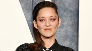 Marion Cotillard wearing one of the key autumn makeup looks, including pink eyeshadow