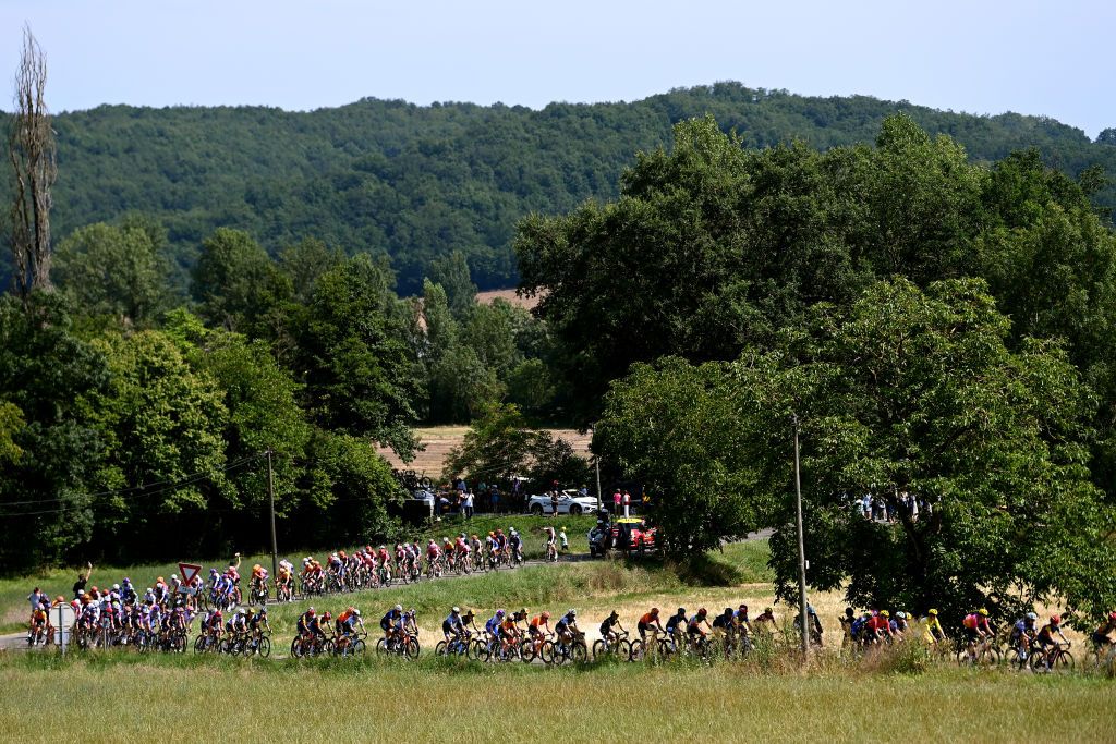 BLAGNAC FRANCE JULY 28 A general view of Lotte Kopecky of Belgium and Team SD Worx Protime Yellow leader jersey and the peloton passing through a landscape during the 2nd Tour de France Femmes 2023 Stage 6 a 1221km stage from Albi to Blagnac UCIWWT on July 28 2023 in Blagnac France Photo by Tim de WaeleGetty Images