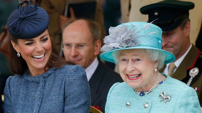 Kate Middleton's 'frugal' Christmas gift to the Queen reportedly forged a bond - the pair seen here watching part of a children's sports event while visiting Vernon Park