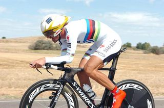 Time trial world champion Fabian Cancellara (Saxo Bank) finished third in stage 17's 46km race of truth.