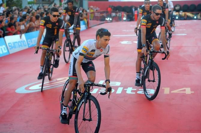 South African champion Louis Meintjes rolling to the team presentation