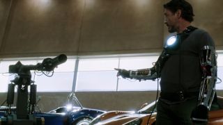 Tony Stark threatening arm robot in Iron Man