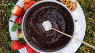 Chocolate fondue with strawberries and marshmellows