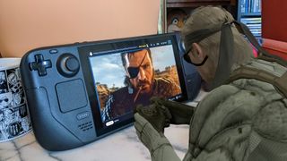 Snake from MGS4 using a controller to control himself on a Steam Deck