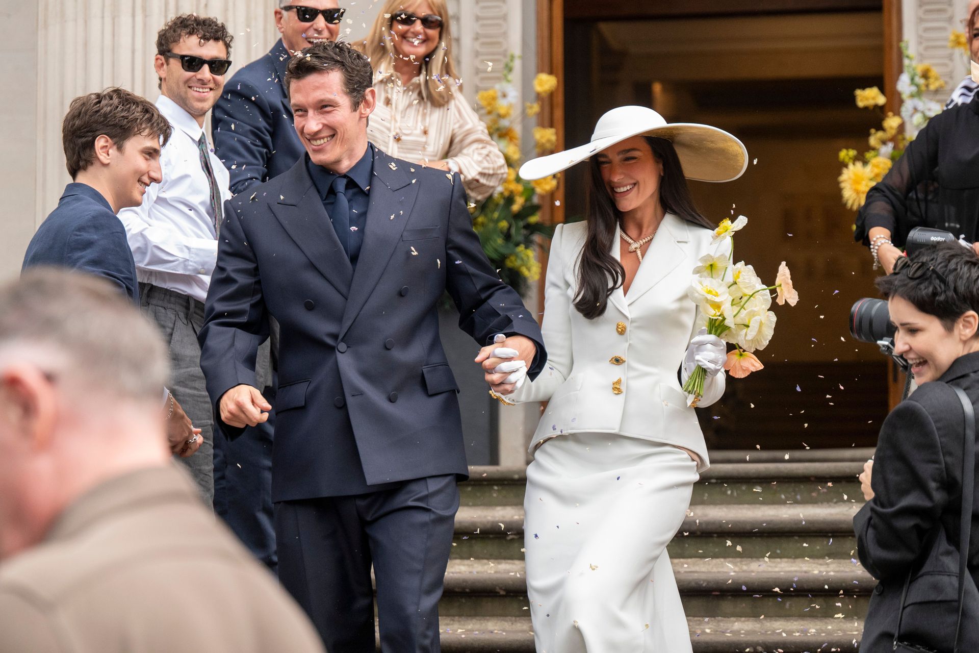 Dua Lipa wearing bridal hat, an emerging trend for 2026.