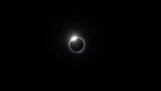 a diamond ring effect caused by a total solar eclipse.