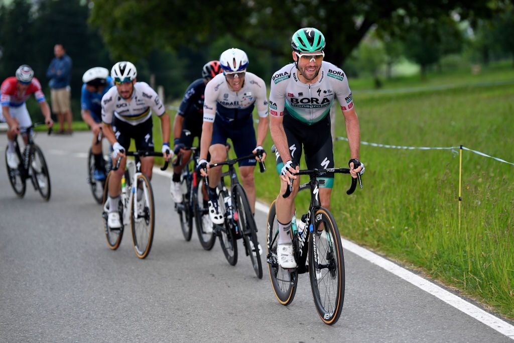 LACHEN SWITZERLAND JUNE 07 Maximilian Schachmann of Germany and Team Bora Hansgrohe in breakaway during the 84th Tour de Suisse 2021 Stage 2 a 178km stage from Neuhausen am Rheinfall to Lachen UCIworldtour tds tourdesuisse on June 07 2021 in Lachen Switzerland Photo by Tim de WaeleGetty Images