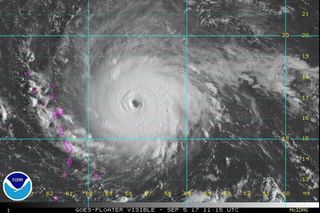 The extremely dangerous Category 5 storm, Hurricane Irma, can be seen east of the Leeward Islands on Sept. 5, 2017.