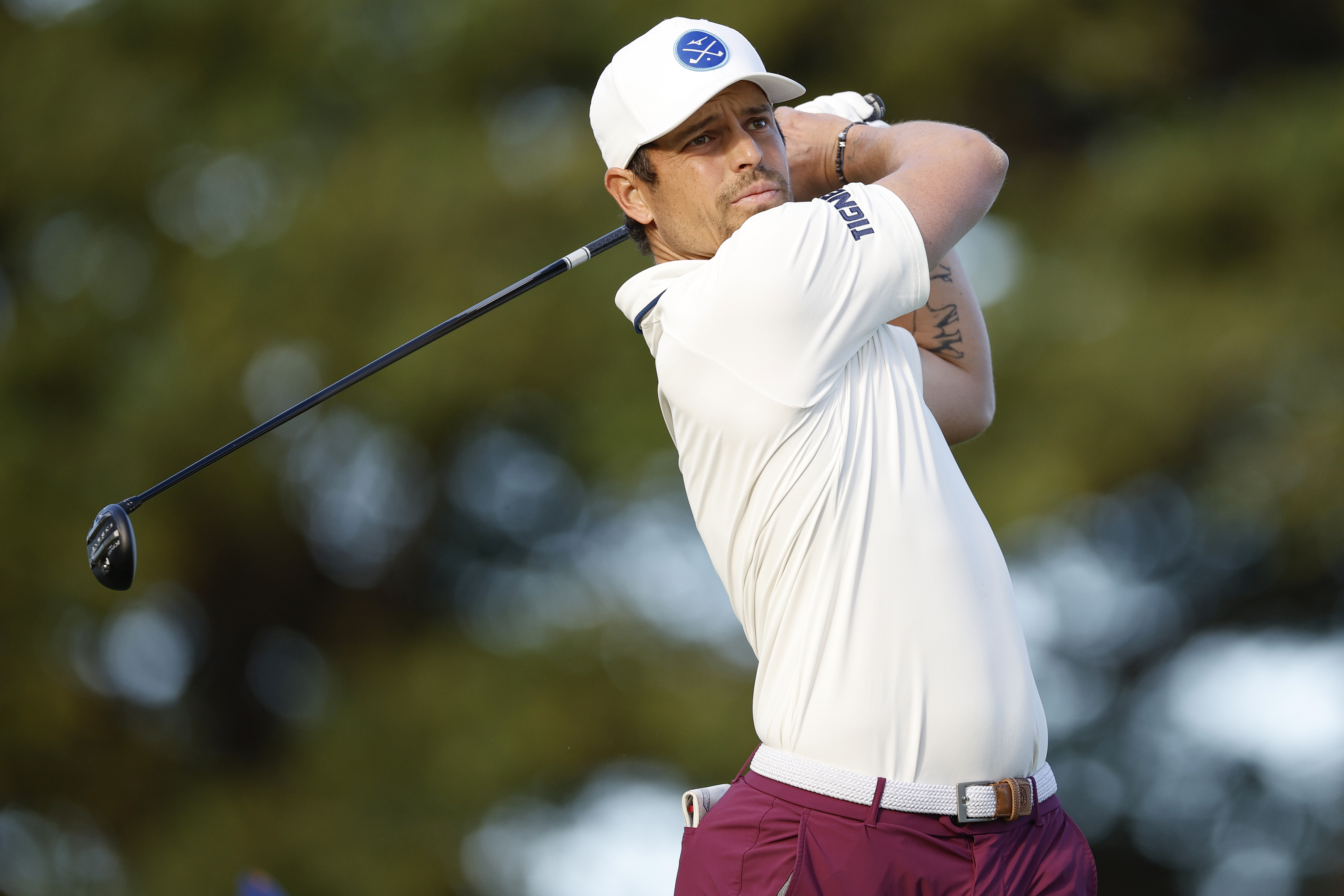 Adrien Saddier hits a fairway wood off the tee