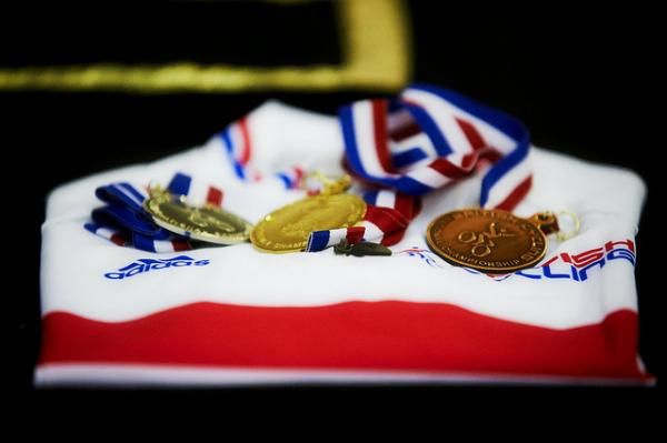 The medals ready to be awarded, sitting on top of the national champion's jersey.