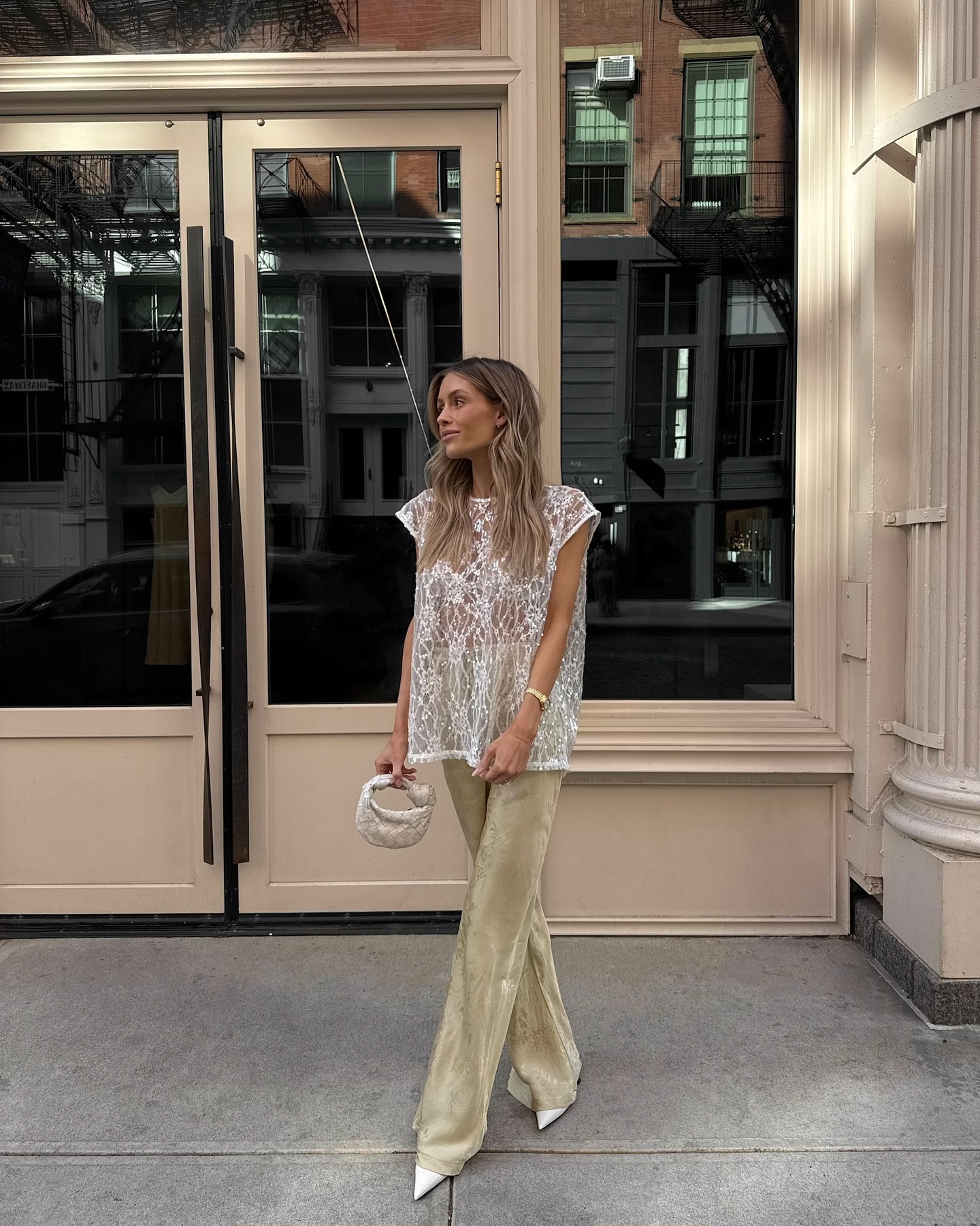 Influencer wears a romantic blouse.