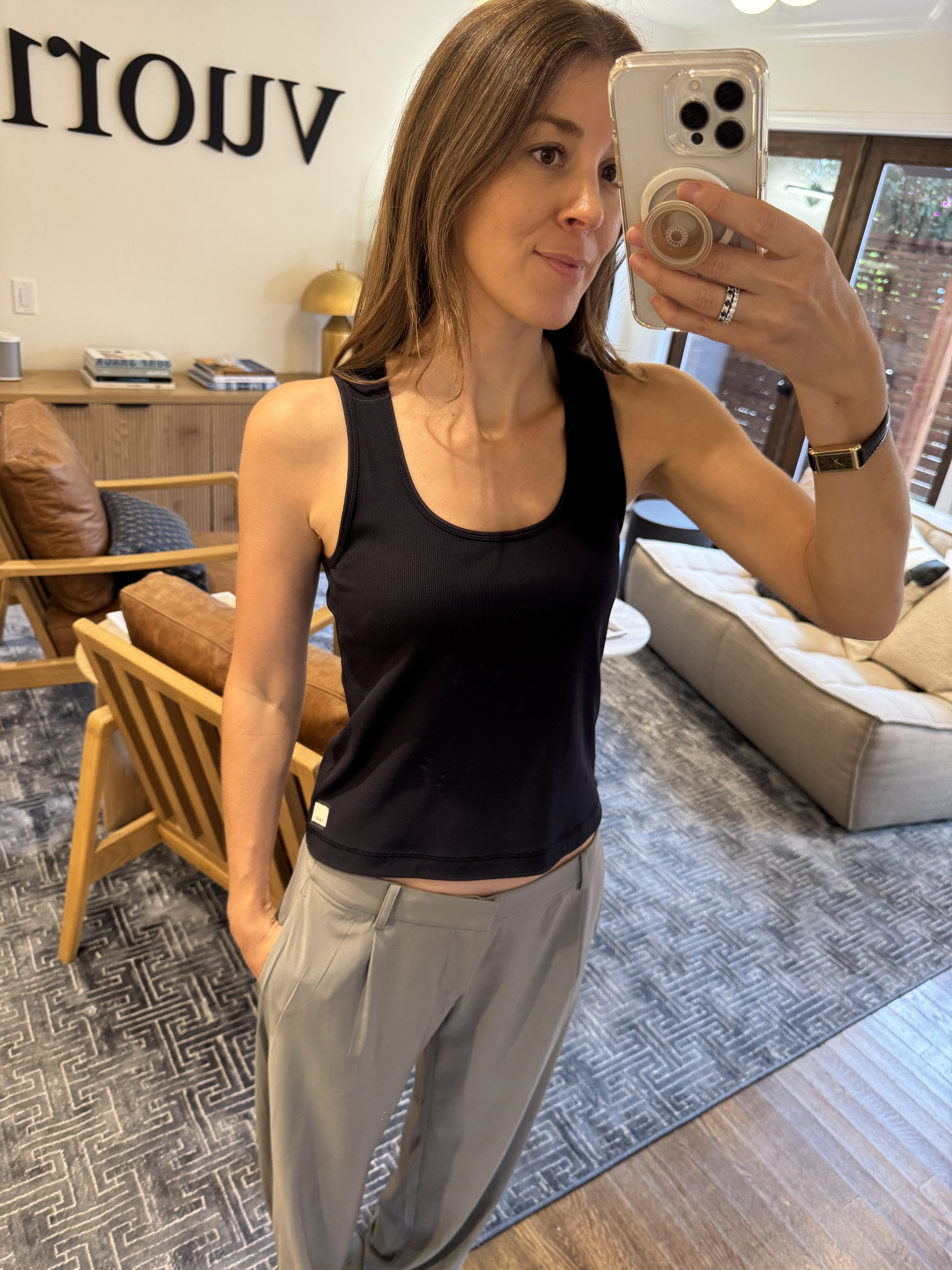 Woman in black Vuori top