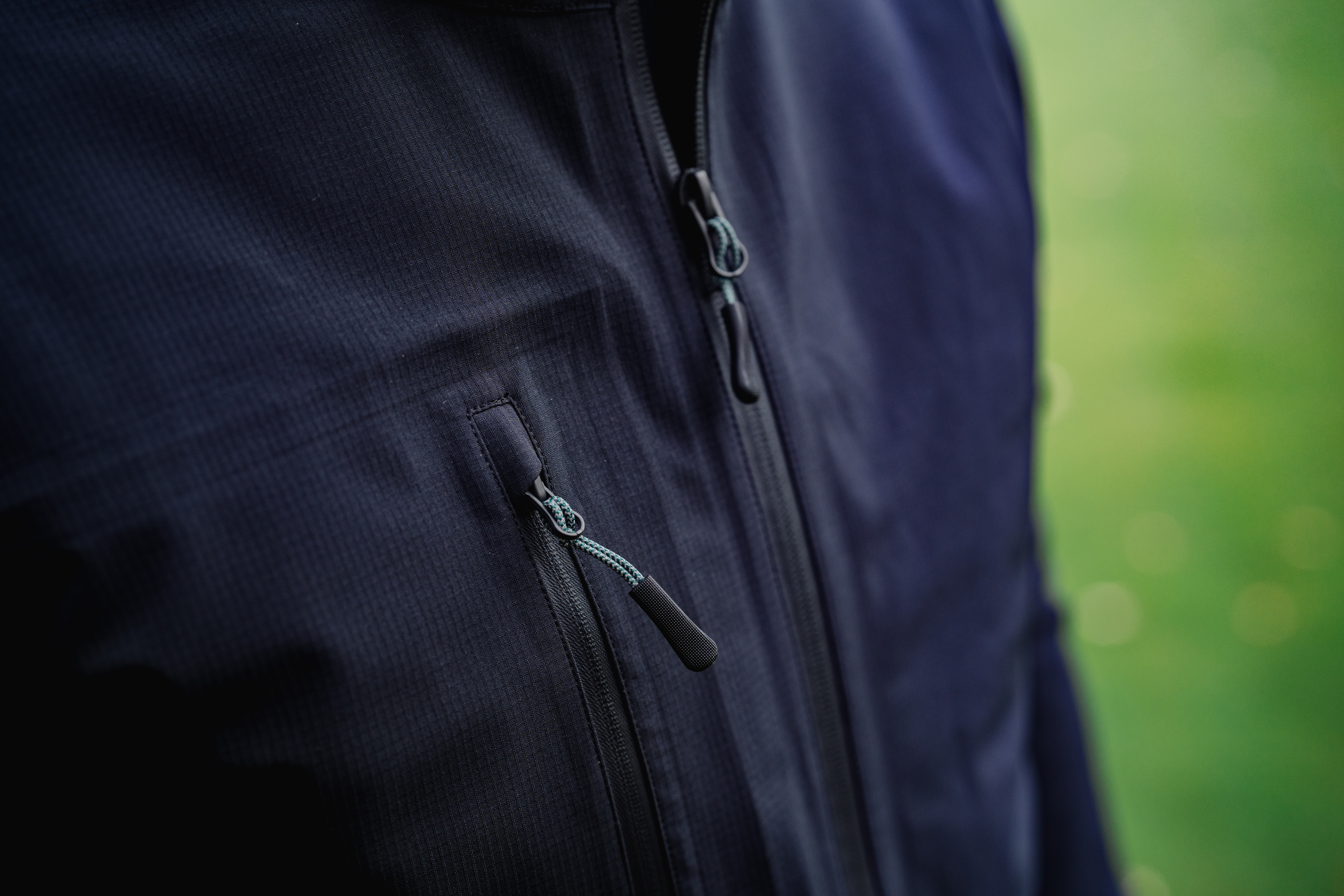 A close-up of the HLINC Full Zip Waterproof Links Golf Jacket