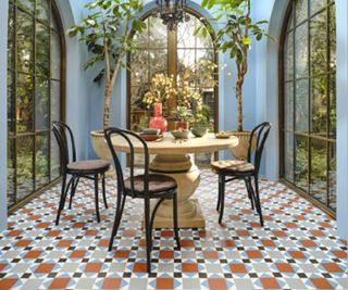 patterned floor tiles in conservatory