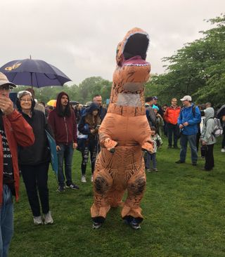 A T. rex invades the National Mall during the 2017 March for Science in Washington, D.C.