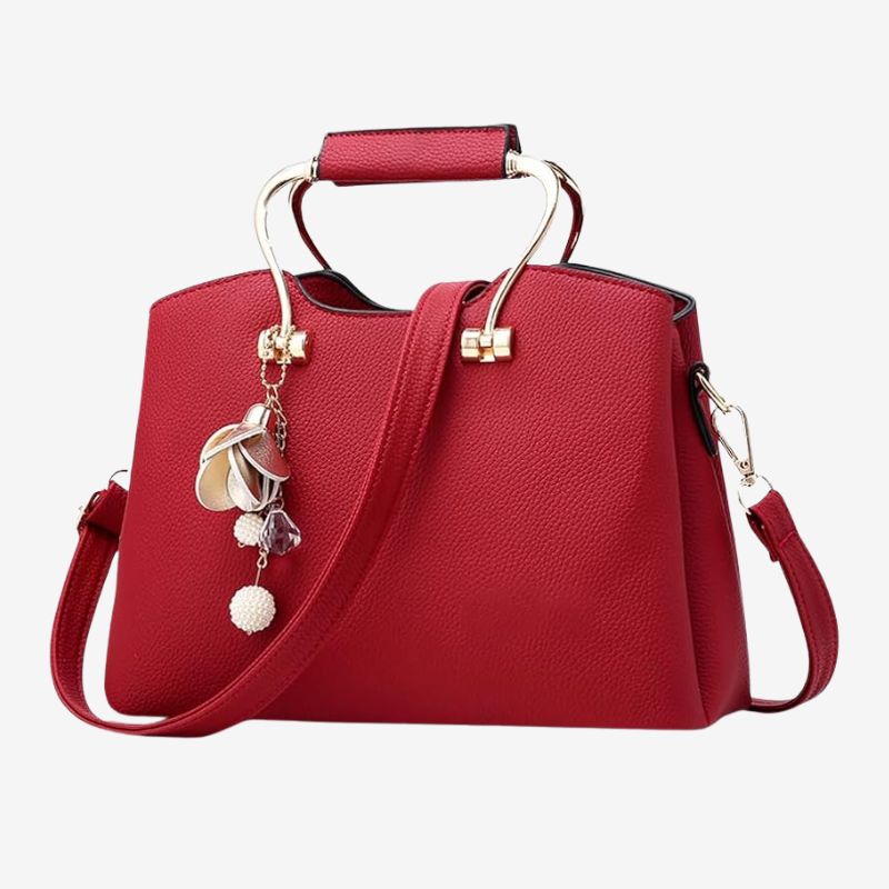 Image of red handle top handbag
