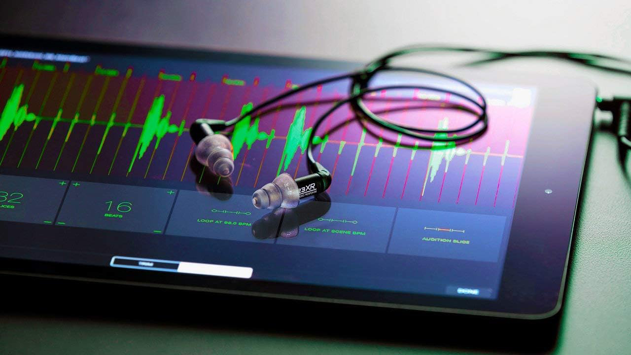 Etymotic Research ER3XR sitting on top of a tablet screen