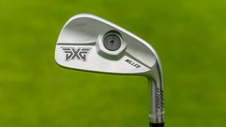 PXG 0317 ST Blades Iron held aloft showing off their clubhead weight